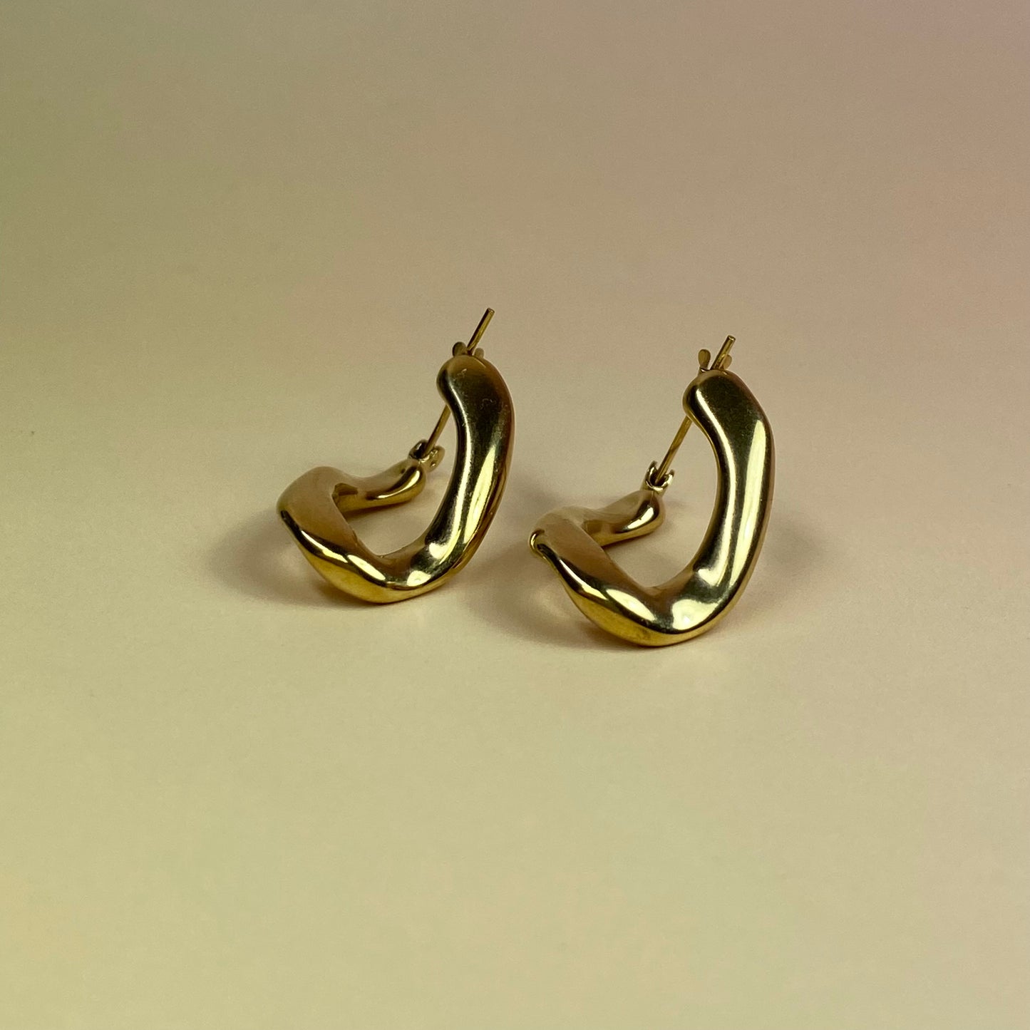 Orecchino girato gold - acciaio jewels