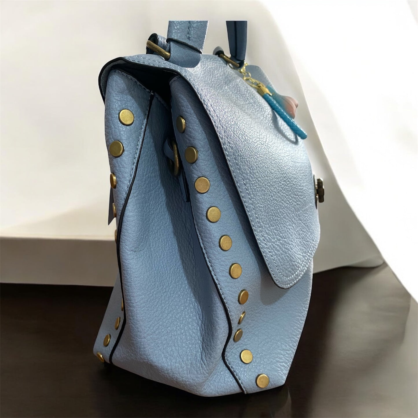 Borsa “La ondulata borchiata” - manico e tracolla
