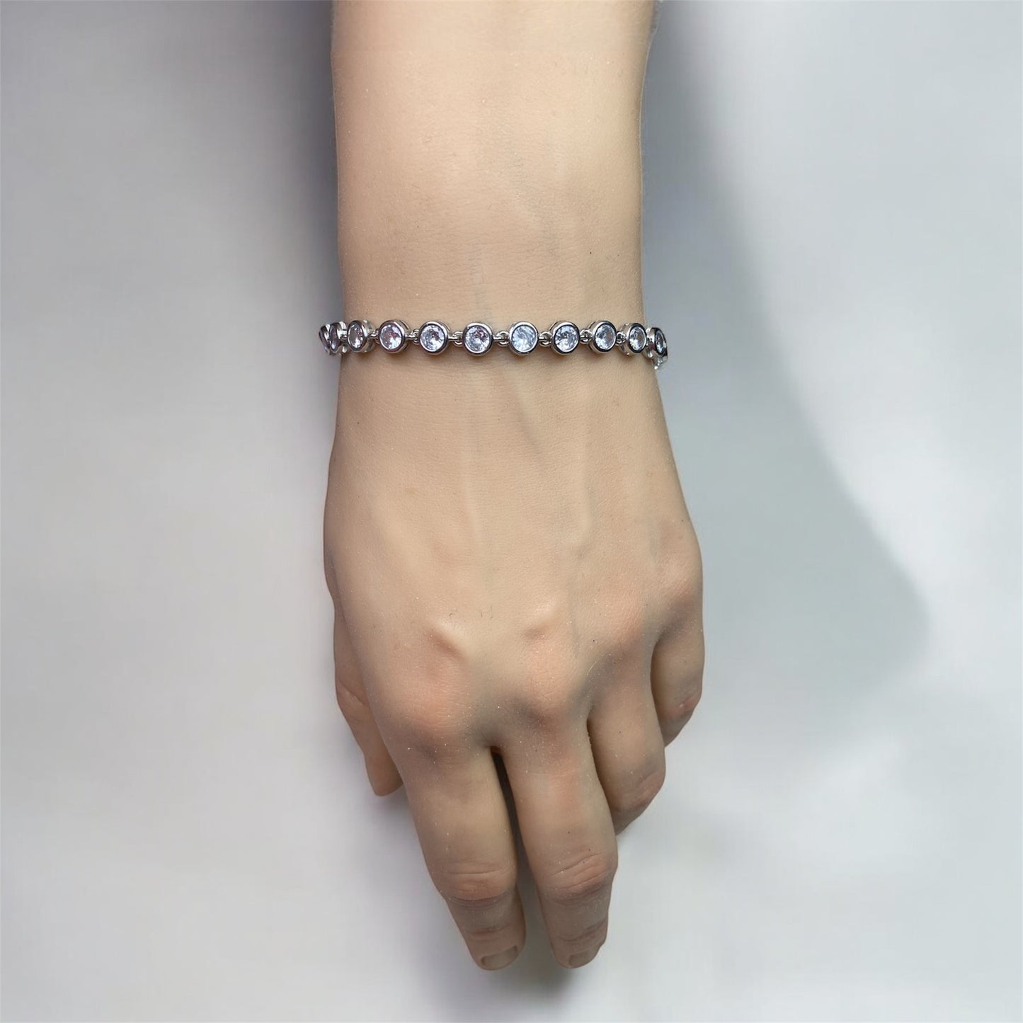 Bracciale cerchietti e zirconi acciaio