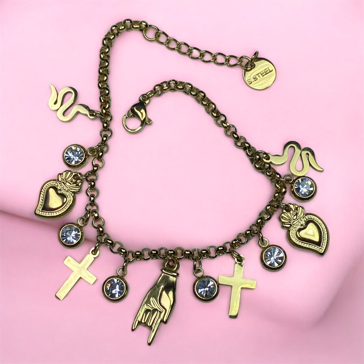 Bracciale con charm in acciaio- cuore-croce-corna-serpente-zirconi