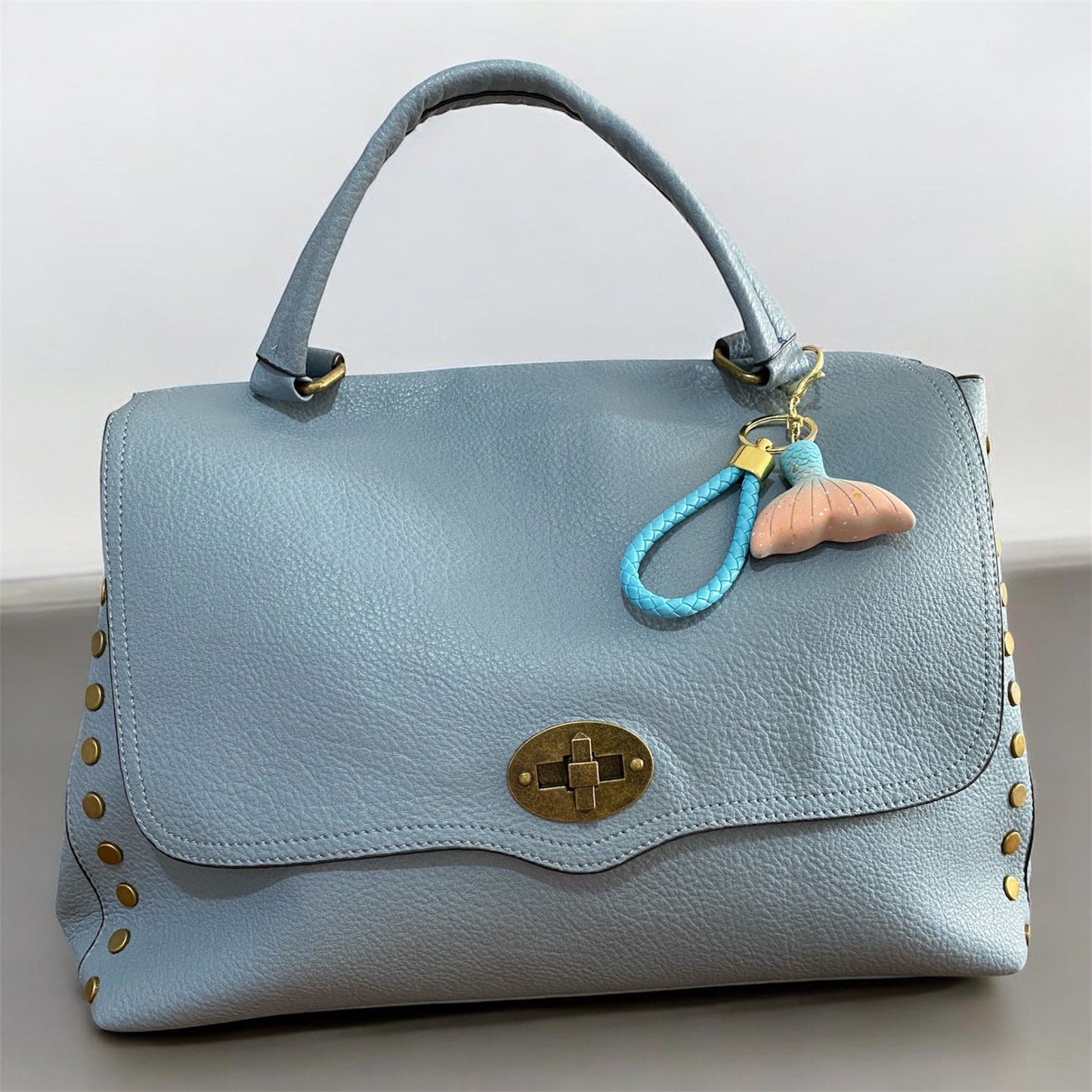 Borsa “La ondulata borchiata” - manico e tracolla